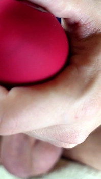 Close-up of Balls Tightening with Red Suction Vibrator