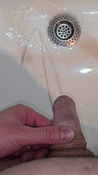 Pissing to the Bathroom Sink