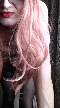A Transvestite, a Slutty Girl in a Maid's Dress, Records Herself on Webcam