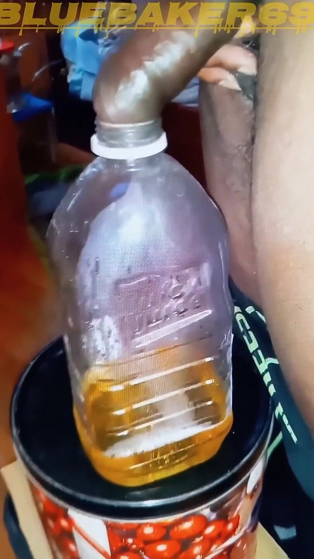 Pissing in a Large Juice Container (Blue Baker 69) Pissing in a Large Juice Container (Blue Baker 69)