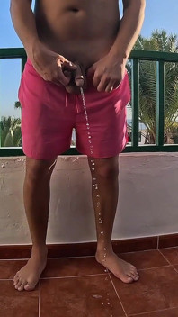 Peeing on the Balcony on Holiday