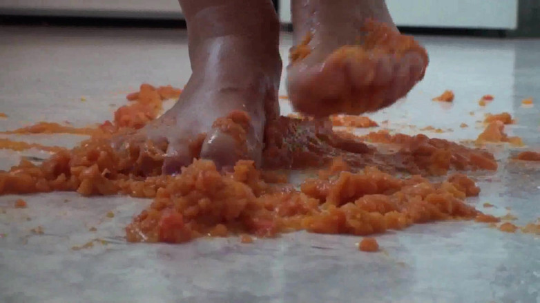 Foot Girls: Close up of trampling food in the kitchen