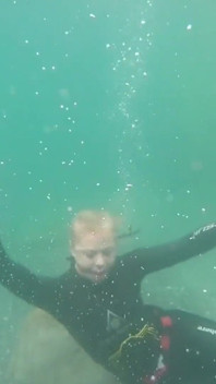 Ocean Rope Bondage with Ballgag in Wetsuit