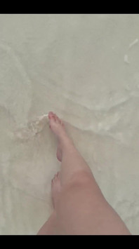 Running my bare feet on the white beach sand by the ocean.
