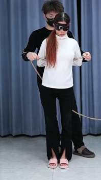 The Extreme Restraints of a Barefoot Girl, Playing with Her Bare Feet