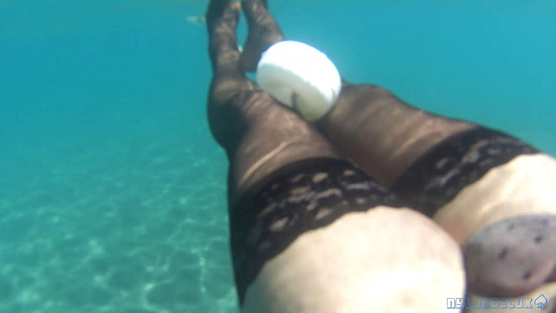 Nylondelux: Black Stocking in the Sea