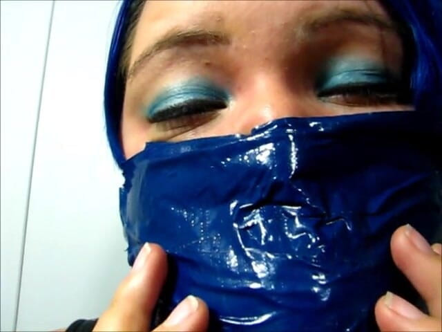Selfgags classic: Layla makes herself another cruel, tight, and massive gag with 18...