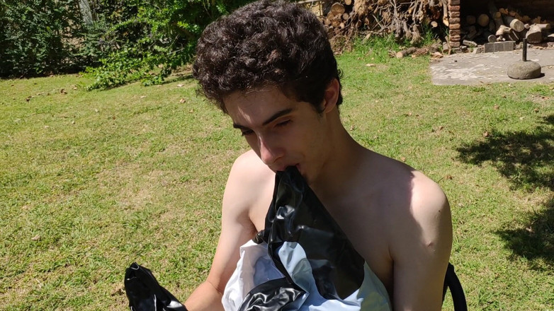 Floatie Boy: Beautiful Man Inflates His Inflatable Whale Near Pool Outside