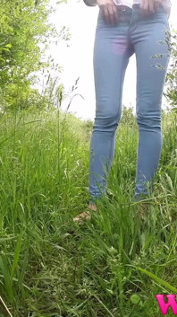Skinny Brunette with Full Bladder Has to Pee in the Forest and Wet the Tall Grass Touching Her Wet Pussy