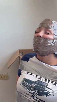 Fantasizing 18-year-old Taped & Gagged by Masked MILF