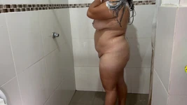 I Spy on My Sexy Stepmom with Tits and Big Ass While She Bathes and Touches Herself Nice While She Showers.