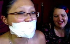 Teaching little mina the art of self-gagging!