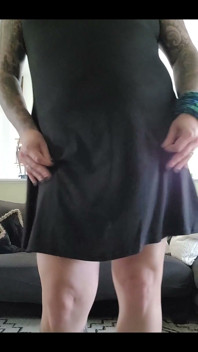 Looking Cute in a Black Dress and Boots