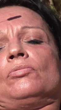 The busty milf eager for sex is fucked in the fields by a long cock alternating with sex toys