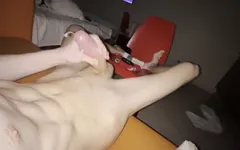 Athletic Russian guy with a massive cock cums on his abs with moans