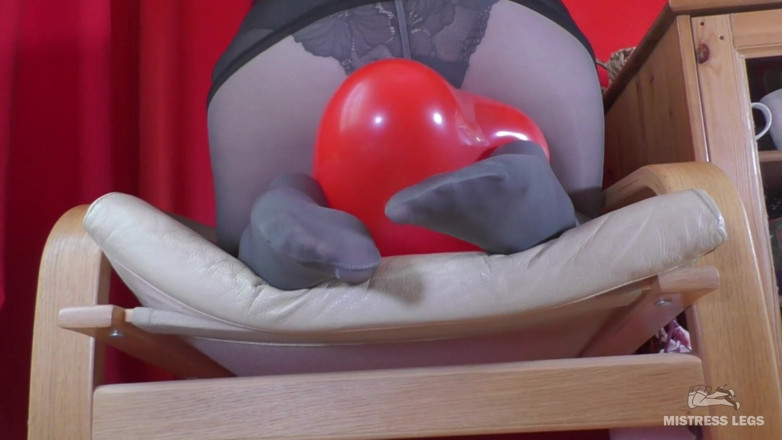 Mistress Legs: Mistress in gray opaque pantyhose and high heels plays with...