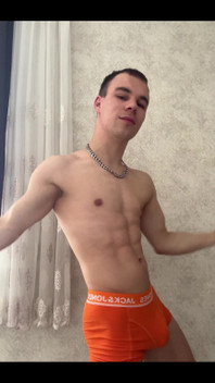 Cute Athlet Boy Showing Muscle
