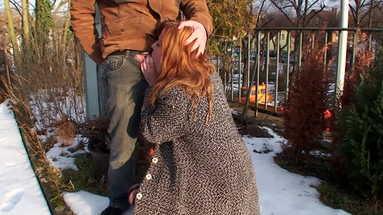 Public Entertainment: Mature woman having fun outside