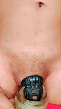 Standing Pissing in Chastity Cage