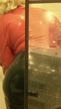 Sexy MILF in latex rubber - Shower striptease