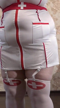 A Mature Wife Is Getting Ready for a Christmas Party and Trying on a Nurse's Uniform. Does She Want to Get Fucked There? PAWG.