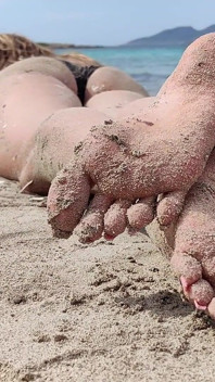 Covered in Sand and Above It All