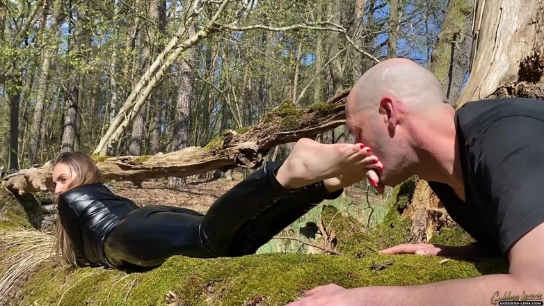 Goddess Lena: I enjoy the sun as he licks my feet