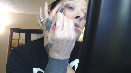 Abby Anna: Doing make up dangling smoke