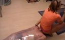 Femdom Austria: Nare meesteres bond haar slaaf vast met een plastic folie