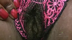 Hairy and black Chocolate changes her lingerie