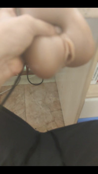 Masturbating