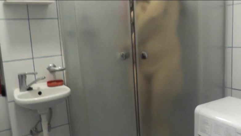 XXX-Platinum: In Shower Beautiful Woman with Long Hair Washes and Pisses