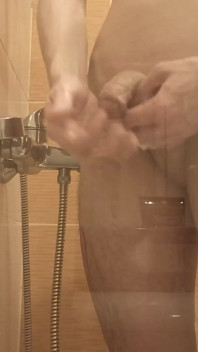 A Young Guy Washes in the Shower and Dreams of Someone Being Next to Him