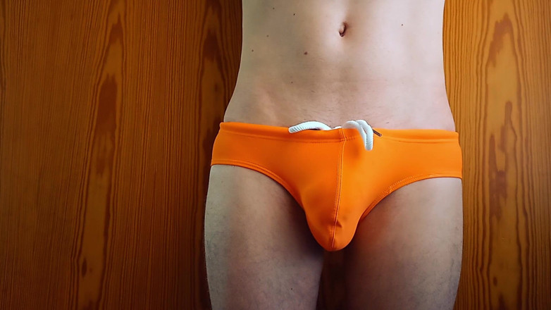 TheOldBigThing: Growing Bulge in Orange Swim Trunk - What Every Boy Fears...