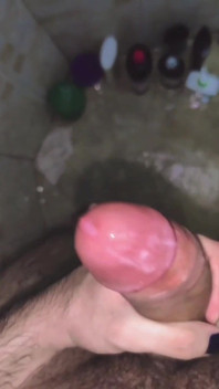 Jerking off in the shower and shooting my load