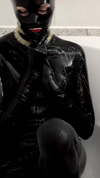 Rubber Slut Swallowing and Bathing in Milk