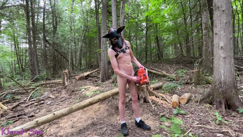 Khawal Star: Khawal Anubis naked outdoors using chainsaw