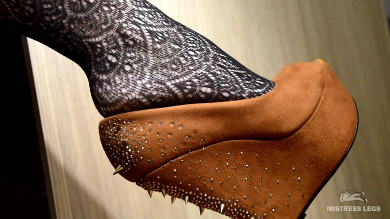 Mistress Legs: My lazy dangling shoe on the feet in black fishnets