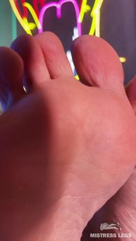 My Bare Wrinkled Soles and Toes on the Table Closeup