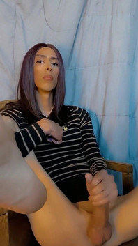 Slim Transsexual Dawn Rivera Cums on Her Feet After an Intense Masturbation Session