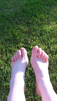 Walking with My Feet on the Grass and Showing Them to You up Close