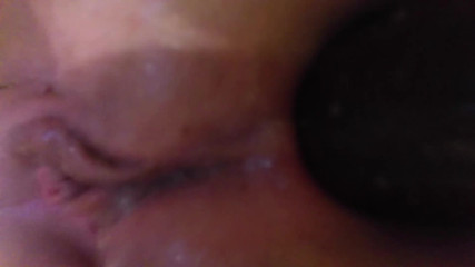 Redhead Huntress: Hot close up masturbation in both holes
