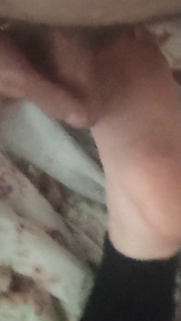 Playing with Friends Soles, While She's Reading.