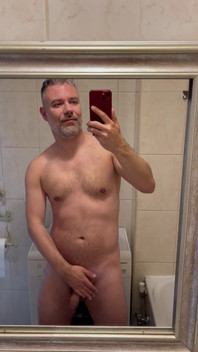 Morning Stretching in Front of a Mirror