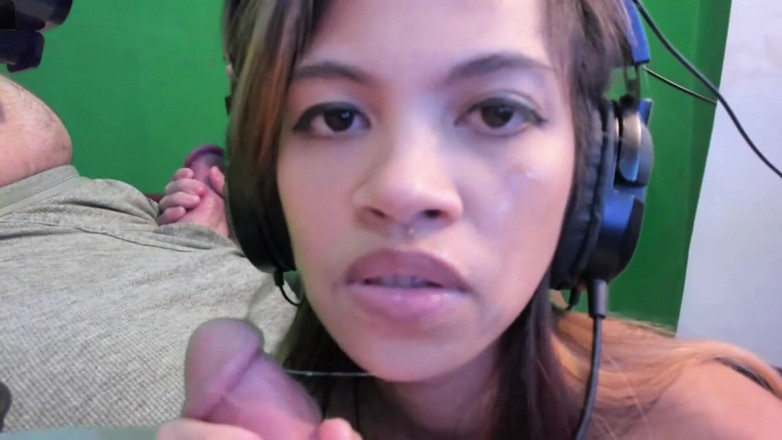 SexyGamingCouple: She Stroking his dick while he plays game with handjob...