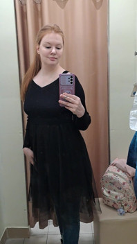 What Words Pop Into Your Head When You Look at the Red-haired Mistress in the Black Dress?