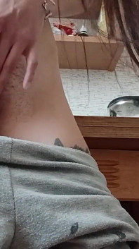 Skinny Brunette Masturbates on the Kitchen Table