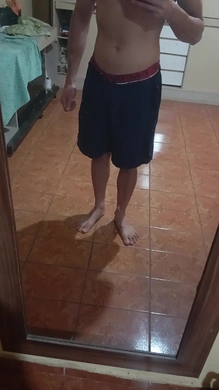 Ray Oliver: Boy in Shorts in the Mirror