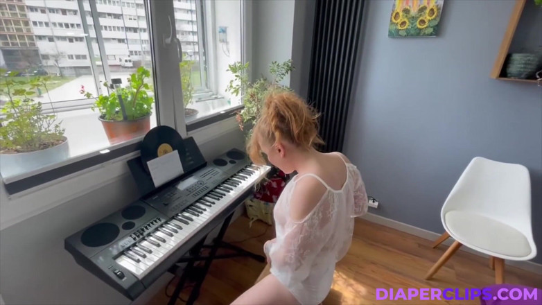 Nicole White: Playing on Keyboard.