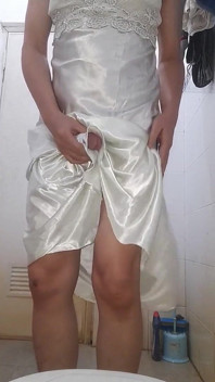 Asian Crossdresser wearing long silky nightie gown